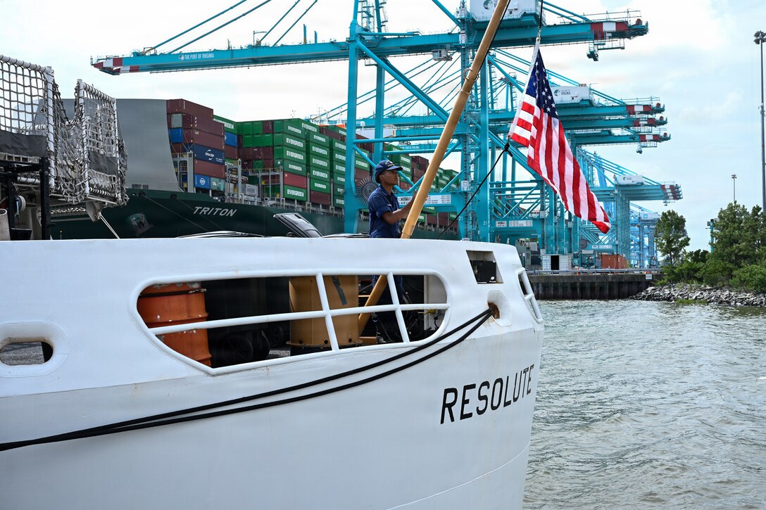 The crew of the Reliance-class medium-endurance cutter USCGC Resolute (WMEC 620) arrives at its new homeport at Coast Guard Base Portsmouth, July 13, 2026. The Resolute is one of two 210-foot  medium endurance cutters relocating from St. Petersburg, Florida, to Base Portsmouth as part of a strategic homeport shift bringing approximately 154 personnel and their families to the Hampton Roads area. (U.S. Coast Guard photo by Petty Officer 2nd Class Kate Kilroy)