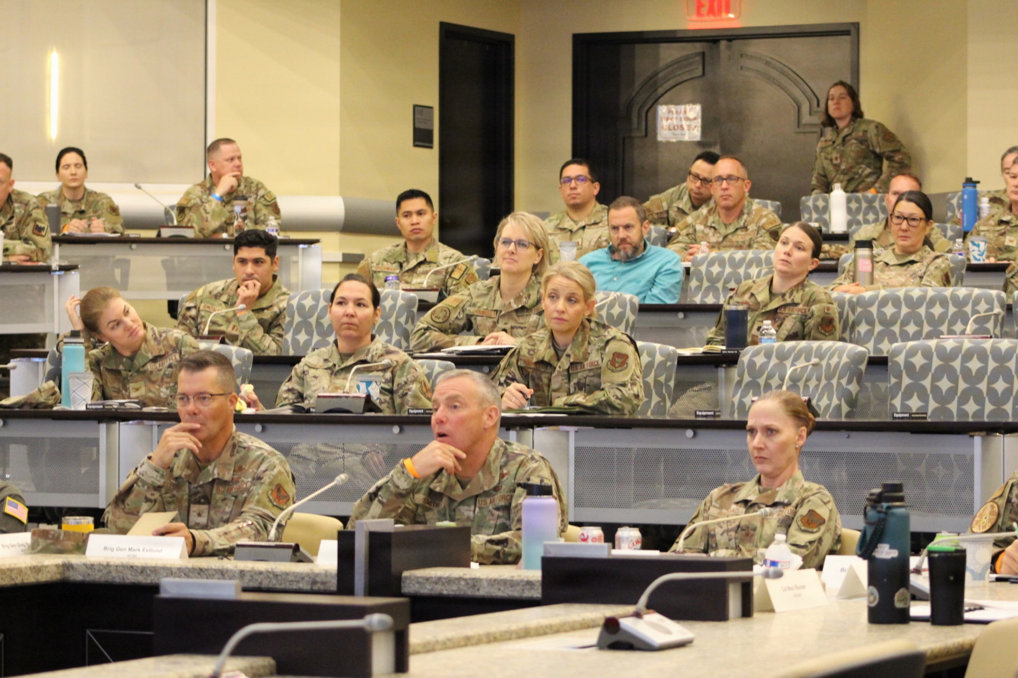 Service members sitting in audience