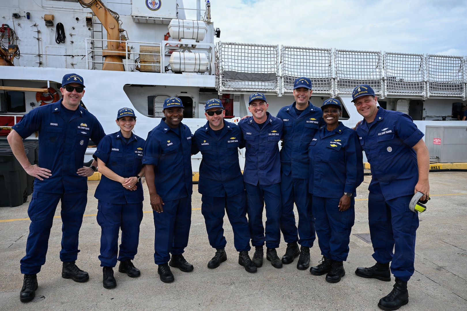 Coast Guard command and crew members of the Reliance-class medium-endurance cutter USCGC Resolute (WMEC 620) are greeted by Base Portsmouth's command and Atlantic Area members following the cutter's arrival at its new homeport, July 13, 2026. The Resolute is one of two 210-foot medium endurance cutters relocating from St. Petersburg, Florida, to Base Portsmouth as part of a strategic homeport shift bringing approximately 154 personnel and their families to the Hampton Roads area. (U.S. Coast Guard photo by Petty Officer 2nd Class Kate Kilroy)