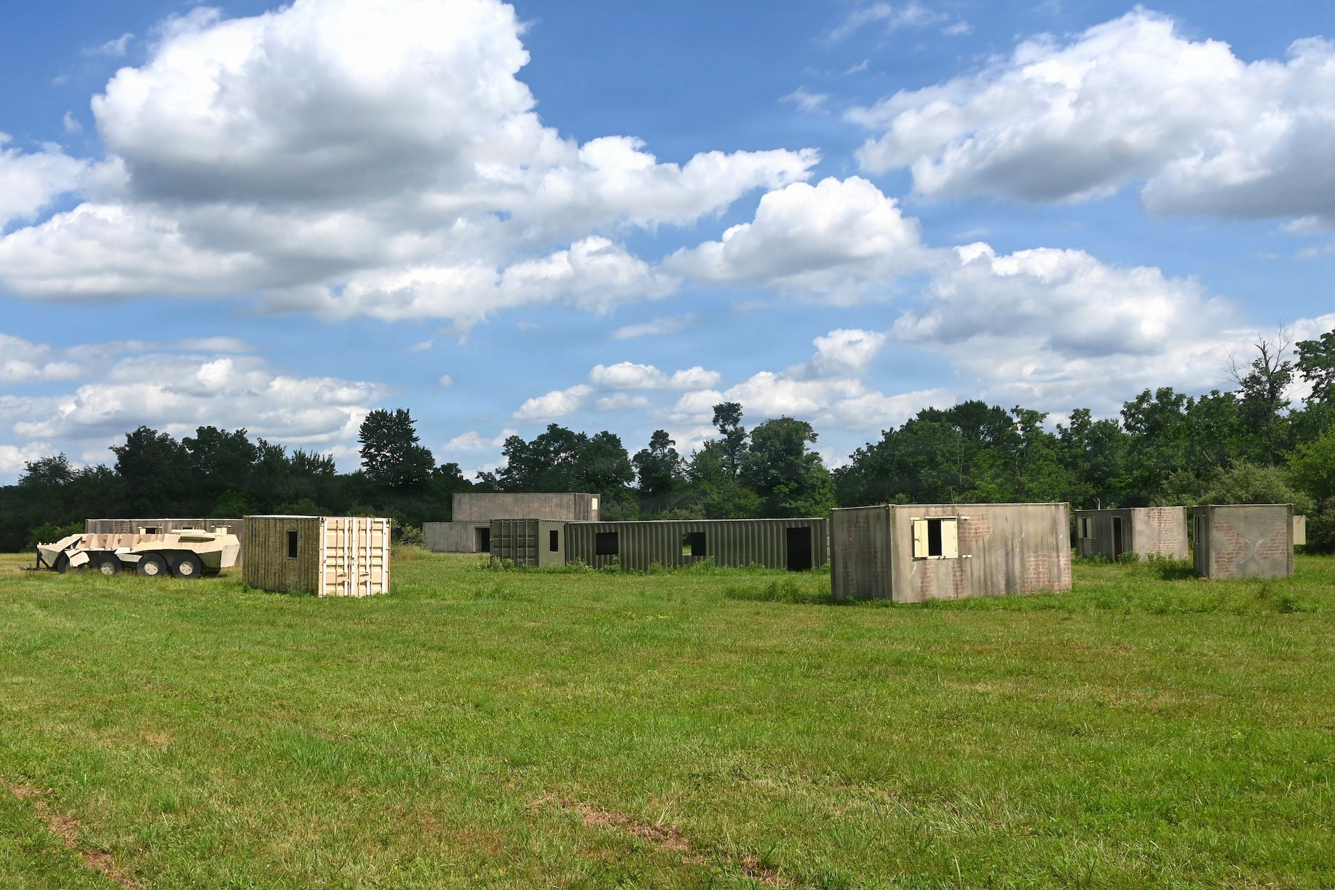 Several shipping containers that have been altered to look like buildings were relocated recently to the grounds of Fort Indiantown Gap's Unmanned Aircraft System Training and Innovation Facility. The mock village allows UAS operators to fly drones around and through simulated buildings in urban environment. (Pennsylvania National Guard photo by Brad Rhen)