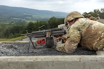 A Soldier assigned to the Delaware National Guard's 1049th Transportation Company fires an M249 Squad Automatic Weapon July 10, 2026, at Fort Indiantown Gap, Pennsylvania. This range now includes a quadcopter and fixed-wing live-fire concept that allows users to engage drones with M249 or M240B machine guns. (U.S. Army Photo by Pfc. Austin Duplessie)