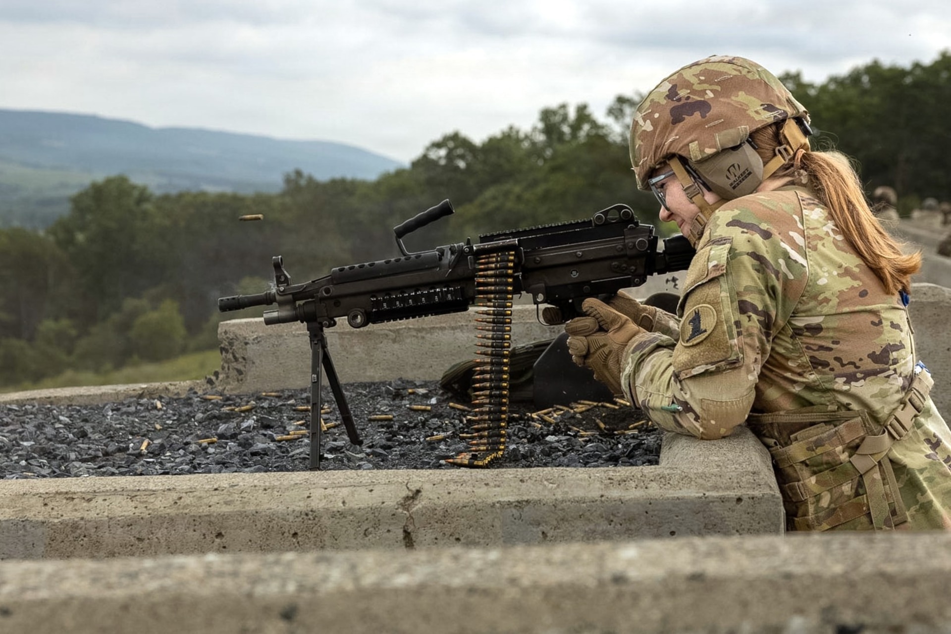 A Soldier assigned to the Delaware National Guard's 1049th Transportation Company fires an M249 Squad Automatic Weapon July 10, 2026, at Fort Indiantown Gap, Pennsylvania. This range now includes a quadcopter and fixed-wing live-fire concept that allows users to engage drones with M249 or M240B machine guns. (U.S. Army Photo by Pfc. Austin Duplessie)