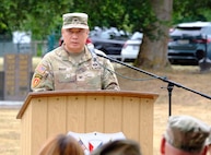 Col. Qui Nguy speaks after taking command of the U.S. Army Medical Materiel Center-Europe during a ceremony July 8, 2026, at Kleber Kaserne in Kaiserslautern, Germany.