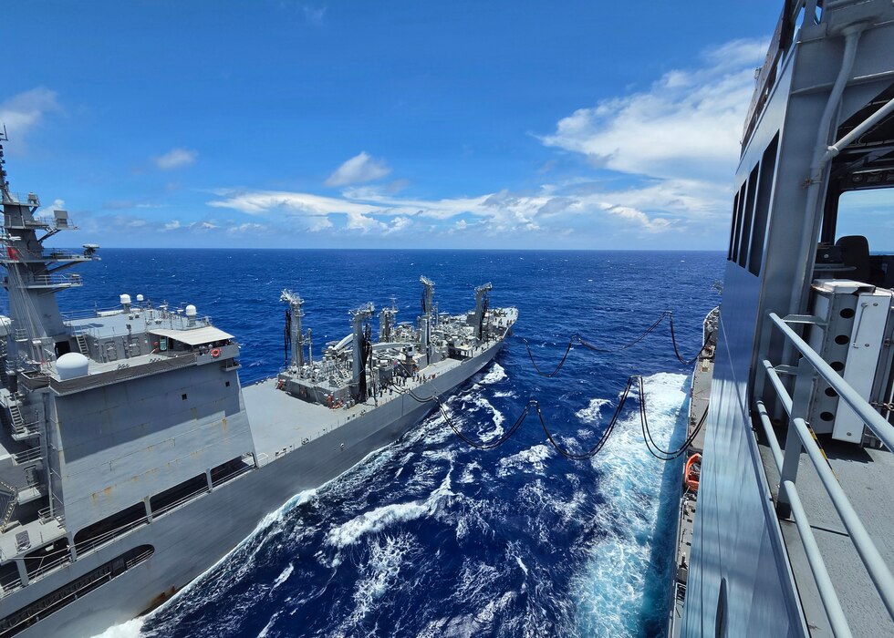 Japan Maritime Self-Defense Force Mashū-class replenishment ship JS Mashū (AOE 425) connects to Military Sealift Command’s John Lewis-class underway replenishment oiler USNS Earl Warren (T-AO 207) during a consolidated cargo replenishment (CONSOL) in the Philippine Sea, June 27, 2026.