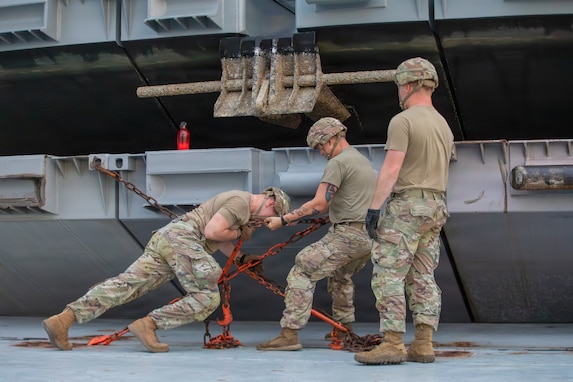 U.S. Army Soldiers unravel and organize ropes on the deck of the motor vessel Ocean Giant at Pohang Port, South Korea, during CJLOTS 26.