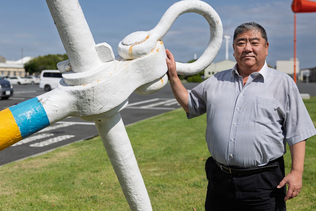 Japanese local national Endo Munenori, a tanker operations officer with Military Sealift Command Ship Support Unit Japan, poses for a photo at Yokohama North Dock, Japan, May 29, 2026. Munenori began working for MSC on June 2, 1985. (Photo by Grady T. Fontana)
