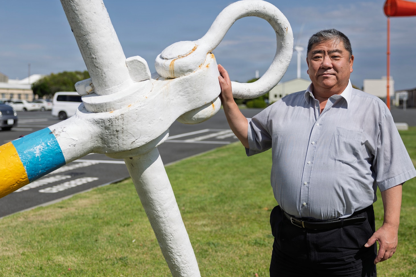 Japanese local national Endo Munenori, a tanker operations officer with Military Sealift Command Ship Support Unit Japan, poses for a photo at Yokohama North Dock, Japan, May 29, 2026. Munenori began working for MSC on June 2, 1985. (Photo by Grady T. Fontana)