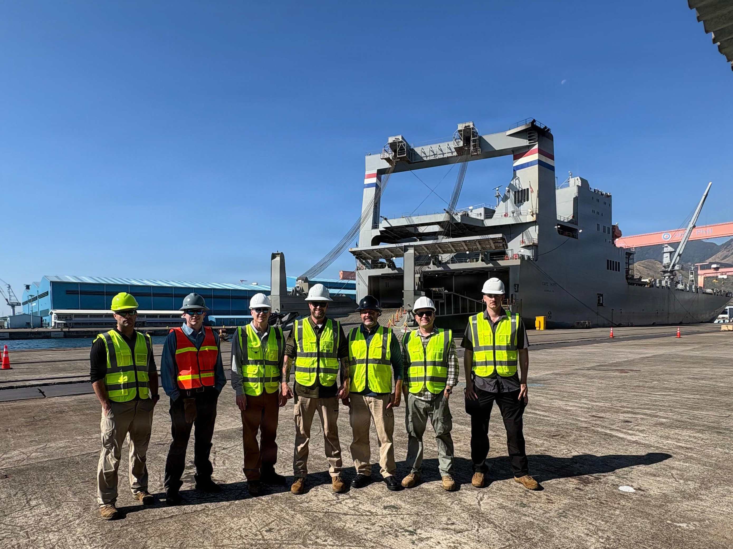 A team from Navy Reserve Military Sealift Command Far East Units pose in front of Maritime Administration ship MV Cape Horn (T-AKR 5068) at Subic Bay, Philippines, during exercise Balikatan 2026, April 9. (Courtesy photo)