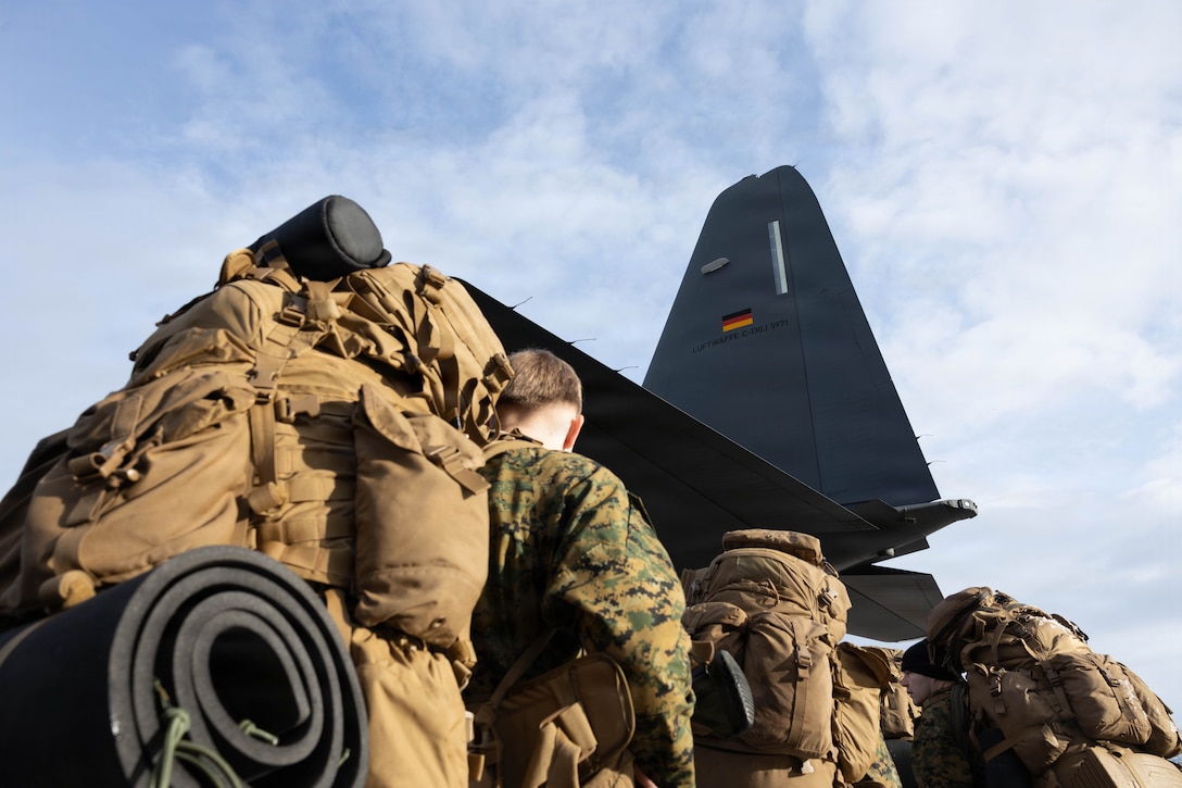 U.S. Marines with 2nd Battalion, 6th Marine Regiment, 2nd Marine Division, board a C-130 aircraft with the German-French Binational Air Transport Squadron (BATS) at Bardufoss Airport, Norway, March 11, 2026. The participation of the German-French BATS highlighted the importance of allied integration and showcased the rapid deployment capabilities of combined NATO forces. A key component of NATO's enhanced vigilance activity Arctic Sentry, exercise Cold Response 26 is a Norwegian-led winter military exercise designed to enhance collective defense capabilities and ensure U.S. readiness to rapidly deploy and seamlessly operate alongside NATO Allies in challenging arctic conditions. (U.S. Marine Corps photo by Cpl. Mya Seymour)
