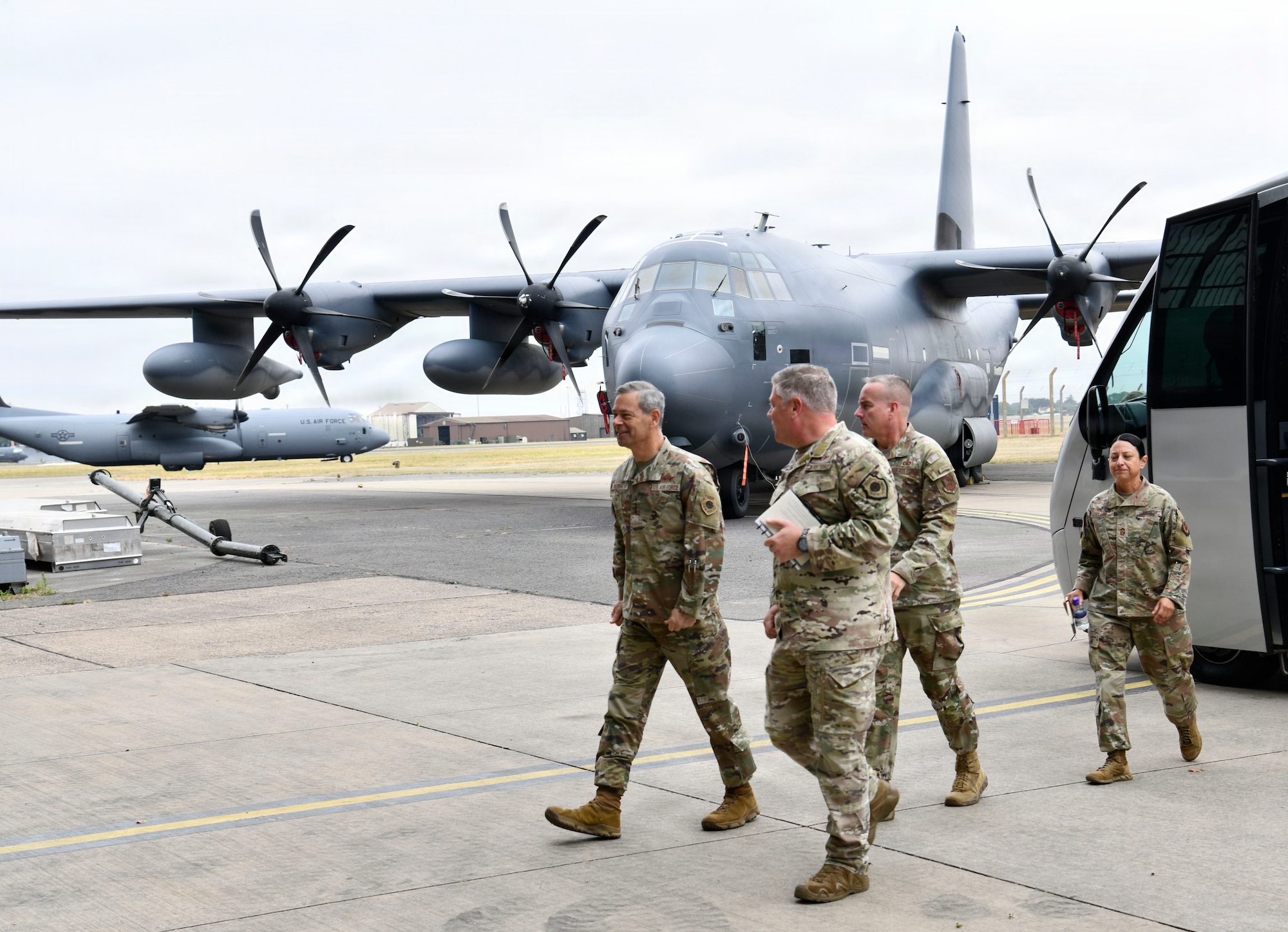 U.S. Air Force Chief of Staff Gen. Ken Wilsbach and Chief Master Sergeant of the Air Force David Wolfe walk with Col. Adam Moore, 352nd Special Operations Wing commander, at RAF Mildenhall, England, July 13, 2026.