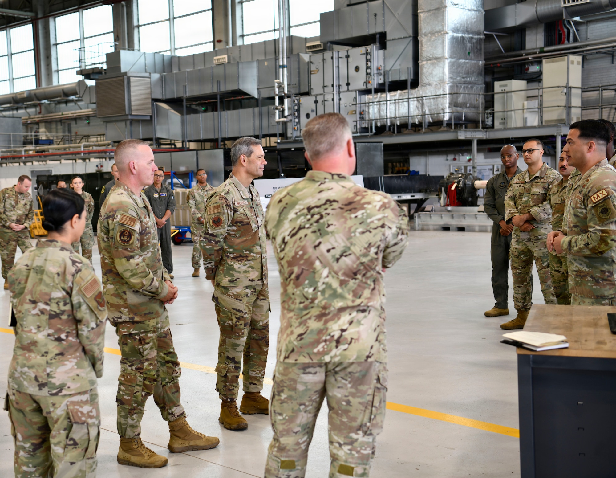 U.S. Air Force Chief of Staff Gen. Ken Wilsbach and Chief Master Sergeant of the Air Force David Wolfe receive a briefing from members of the 352nd Special Operations Wing, at RAF Mildenhall, England, July 13, 2026.