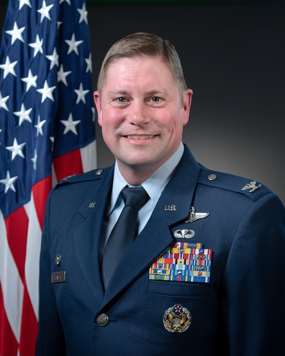 Male service member poses for a photo