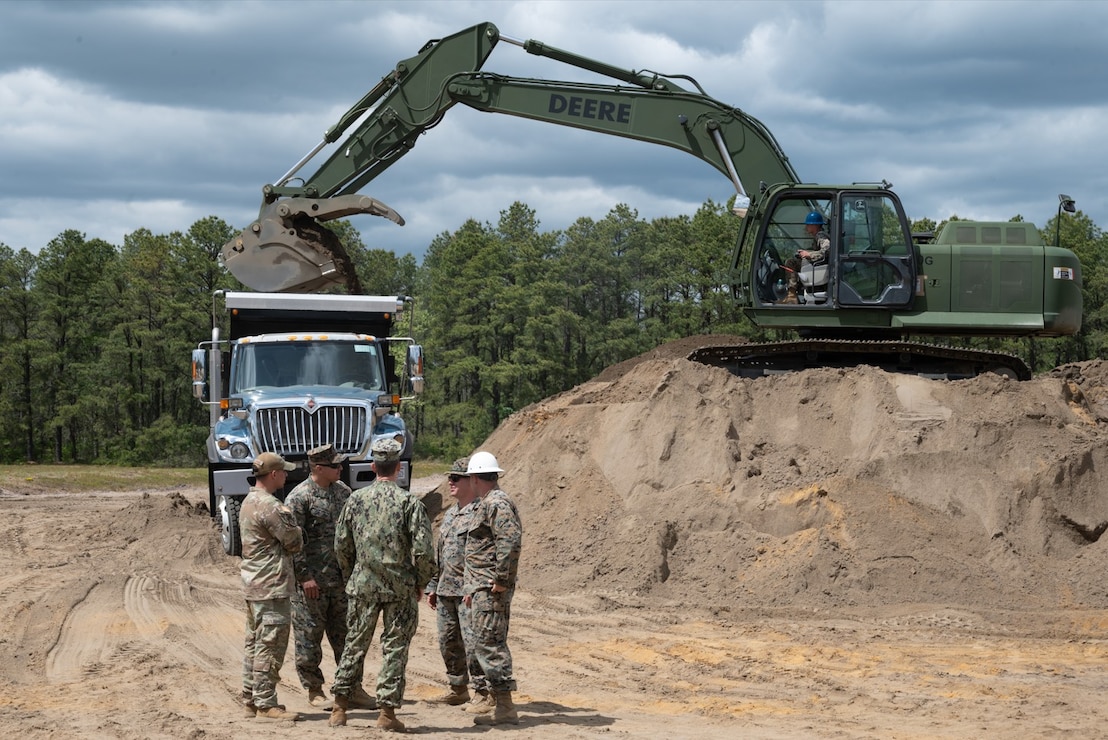 Seabees work with Marine Corps and Army engineers to renovate a rifle range on Joint Base McGuire-Dix-Lakehurst.