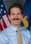 Andrew Pinaire poses for an official portrait at Naval Surface Warfare Center, Carderock Division in West Bethesda, Md. Pinaire serves as team lead for Carderock's Energy Supportability Analysis team, which recently earned the 2026 Warfare Center Innovation Award as part of a joint effort with Naval Surface Warfare Center Dahlgren Division.