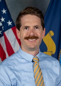 Andrew Pinaire poses for an official portrait at Naval Surface Warfare Center, Carderock Division in West Bethesda, Md. Pinaire serves as team lead for Carderock's Energy Supportability Analysis team, which recently earned the 2026 Warfare Center Innovation Award as part of a joint effort with Naval Surface Warfare Center Dahlgren Division.