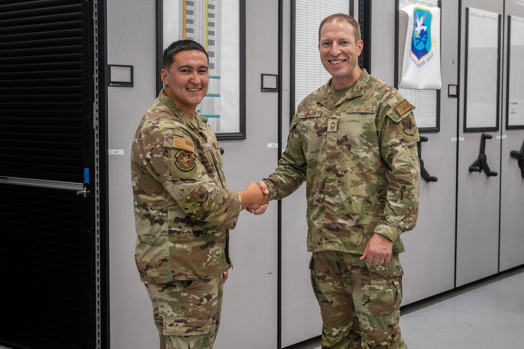 Airmen getting coined by Chief
