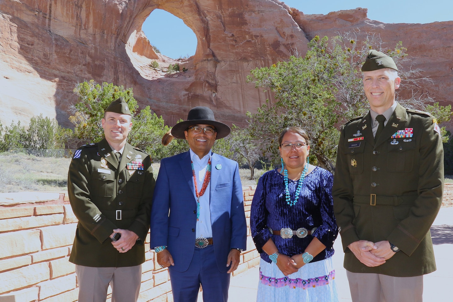 From left to right: Albuquerque District Commander Lt. Col. Matthew Miller, Navajo Nation President Buu Nygren Ph.D., Navajo Nation Siver jackets tribal member Crystal Tulley-Cordova, and USACE Los Angeles District Commander Col. Andrew Baker, pose for a picture beneath Window Rock, before recognizing the Navajo Nation Silver Jackets Team as the “Silver Jackets’ Team of the Year” award for 2025 during and event June 1 in Window Rock, Arizona.