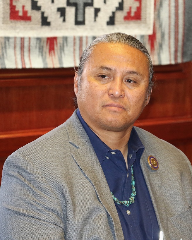 Navajo Nation council delegate from the Birdsprings Chapter Casey Allen Johnson observes as the Navajo Nation President and the U.S. Army Corps of Engineers Los Angeles District Commander Col. sign an agreement for a $3 million feasibility study for the Birdsprings Flood-Risk Mitigation project June 1 in Window Rock, Arizona.