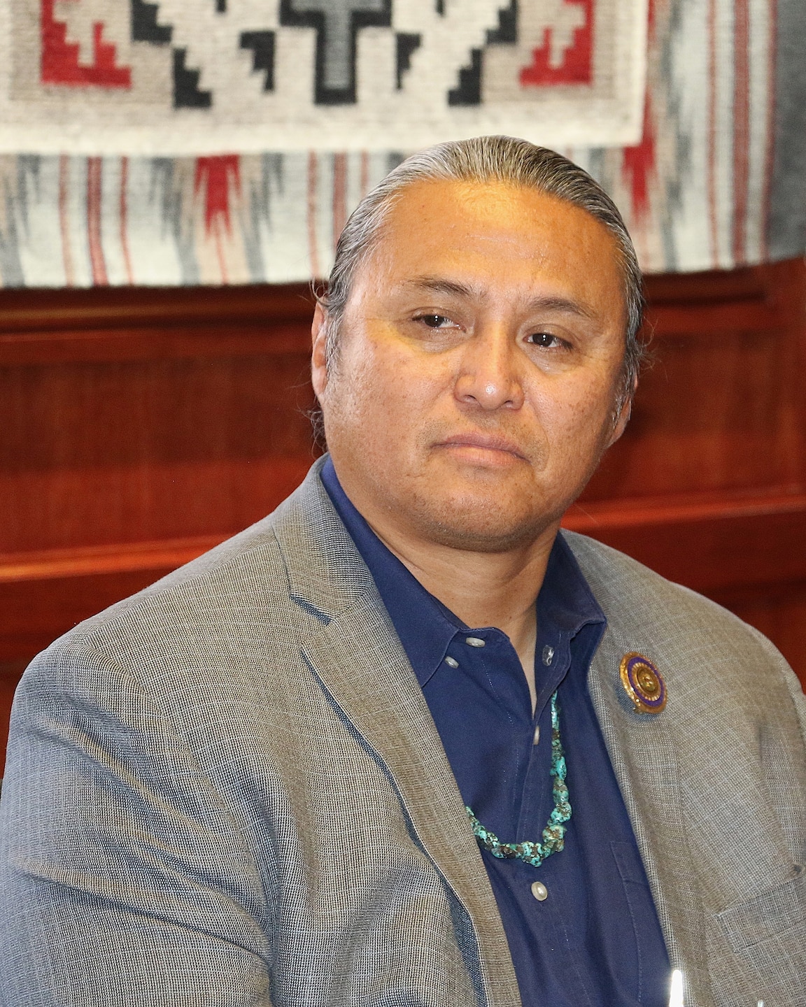 Navajo Nation council delegate from the Birdsprings Chapter Casey Allen Johnson observes as the Navajo Nation President and the U.S. Army Corps of Engineers Los Angeles District Commander Col. sign an agreement for a $3 million feasibility study for the Birdsprings Flood-Risk Mitigation project June 1 in Window Rock, Arizona.