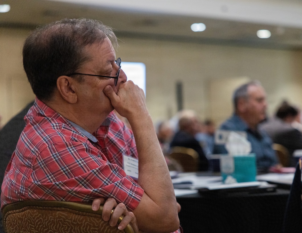 A Gold Star family member listens to as discussion during day two of the Vietnam Annual Government Briefing