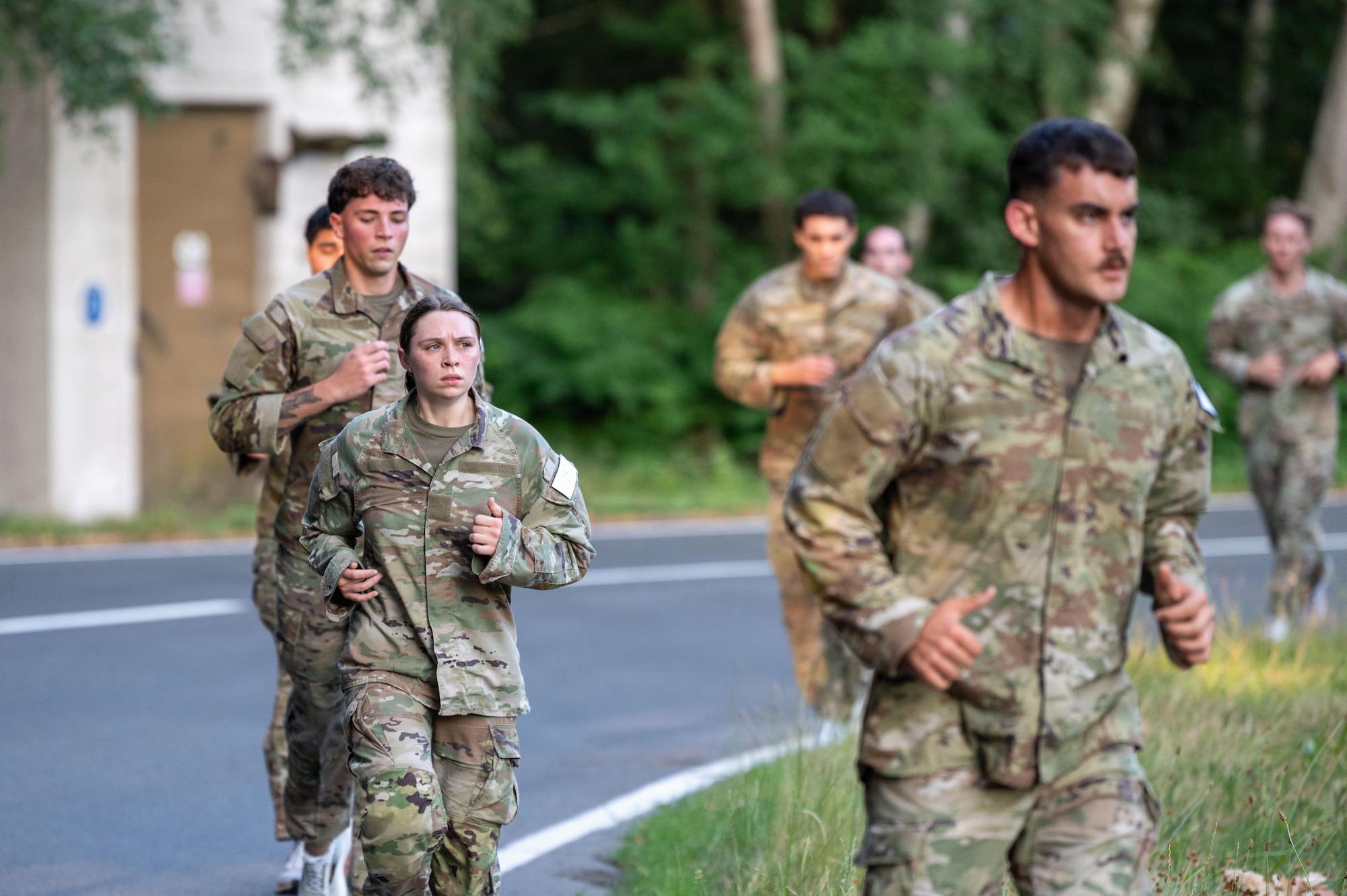 U.S. Air Force Airmen run a 2-mile course during the 435th Security Forces Squadron Air Assault assessment on Ramstein Air Base, Germany, July 9, 2026.