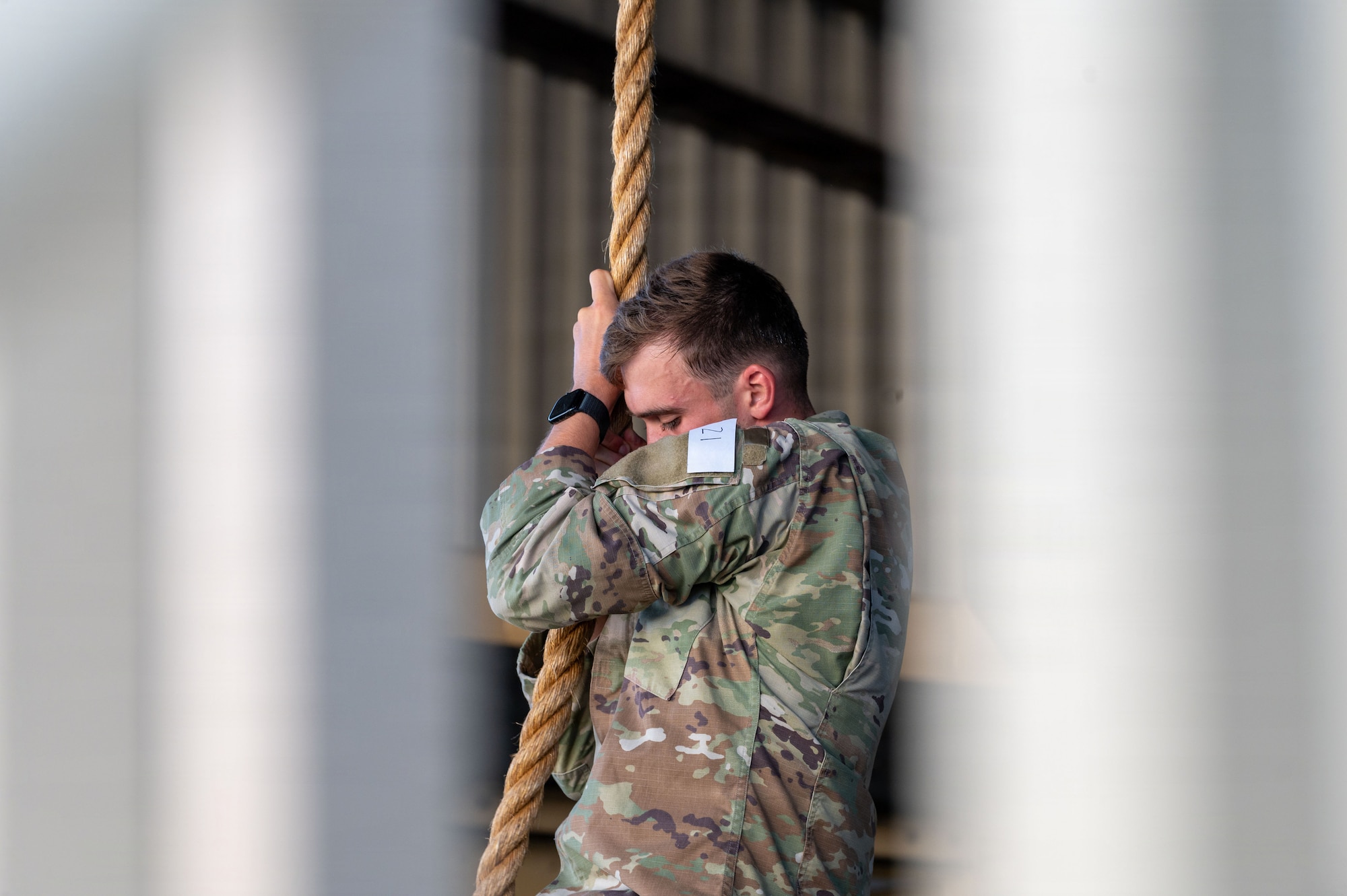 U.S. Air Force Senior Airman Evan Cantrell, 703rd Munitions Support Squadron electronic security systems program monitor, performs a rope climb during the 435th Security Forces Squadron Air Assault assessment on Ramstein Air Base, Germany, July 9, 2026.