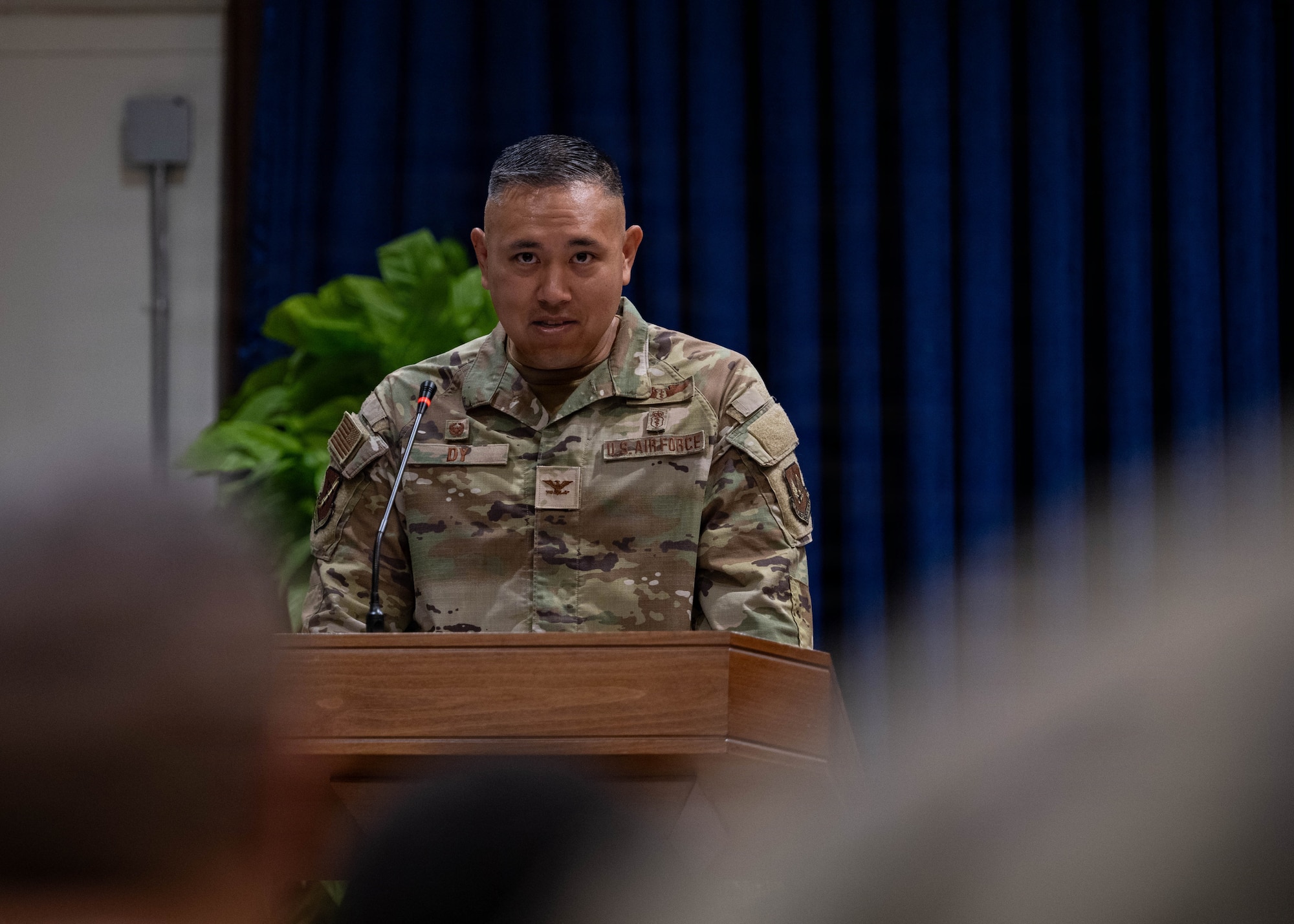 U.S. Air Force Col. David Dy, 39th Medical Group incoming commander, delivers remarks