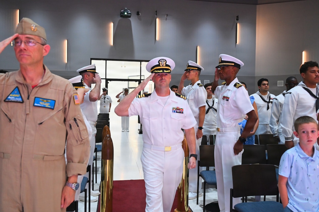 Cmdr. William “PJ” Martin enters the ceremony to be relieved as officer in charge of Navy Medicine Readiness and Training Unit China Lake during a change of charge ceremony at Naval Air Weapons Station China Lake, California, July 10, 2026. (U.S. Navy photo by NAWS China Lake public affairs).