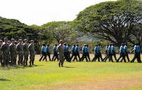 U.S. Army Soldiers from the Wisconsin National Guard stand at parade rest while members of the Papua New Guinea Defence force march onto the field during the opening ceremony of Exercise Tamiok Strike 26 at Murray Barracks, Port Moresby, Papua New Guinea, July 13, 2026.