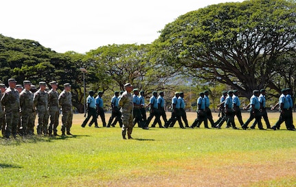 U.S. Army Soldiers from the Wisconsin National Guard stand at parade rest while members of the Papua New Guinea Defence force march onto the field during the opening ceremony of Exercise Tamiok Strike 26 at Murray Barracks, Port Moresby, Papua New Guinea, July 13, 2026.