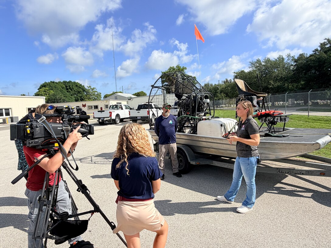 Martin and an Applied Aquatics contractor discuss the herbicides used, the dilution percentages, protective equipment used by the applicators and how the district’s invasive species team tracks the exact movement of the applicator via GPS. The media day provided a closer look at how management decisions are made, what crews encounter on the water, and how the district continues to adapt and improve its approach alongside its partners.