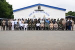 Multinational participants pose for a group photo during the West African Religious Affairs Symposium, or WARAS, in Accra, Ghana, July 14, 2026. U.S. and African military chaplains from 10 partner nations gather for the three-day exchange to discuss methods to support and strengthen service members' spiritual resiliency. Photo by Airman 1st Class Alexandra Dale.