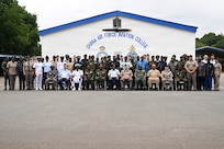 Multinational participants pose for a group photo during the West African Religious Affairs Symposium, or WARAS, in Accra, Ghana, July 14, 2026.