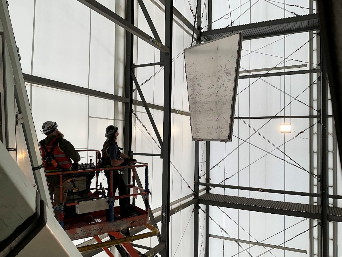 Cadet Chapel restoration milestone panel installation