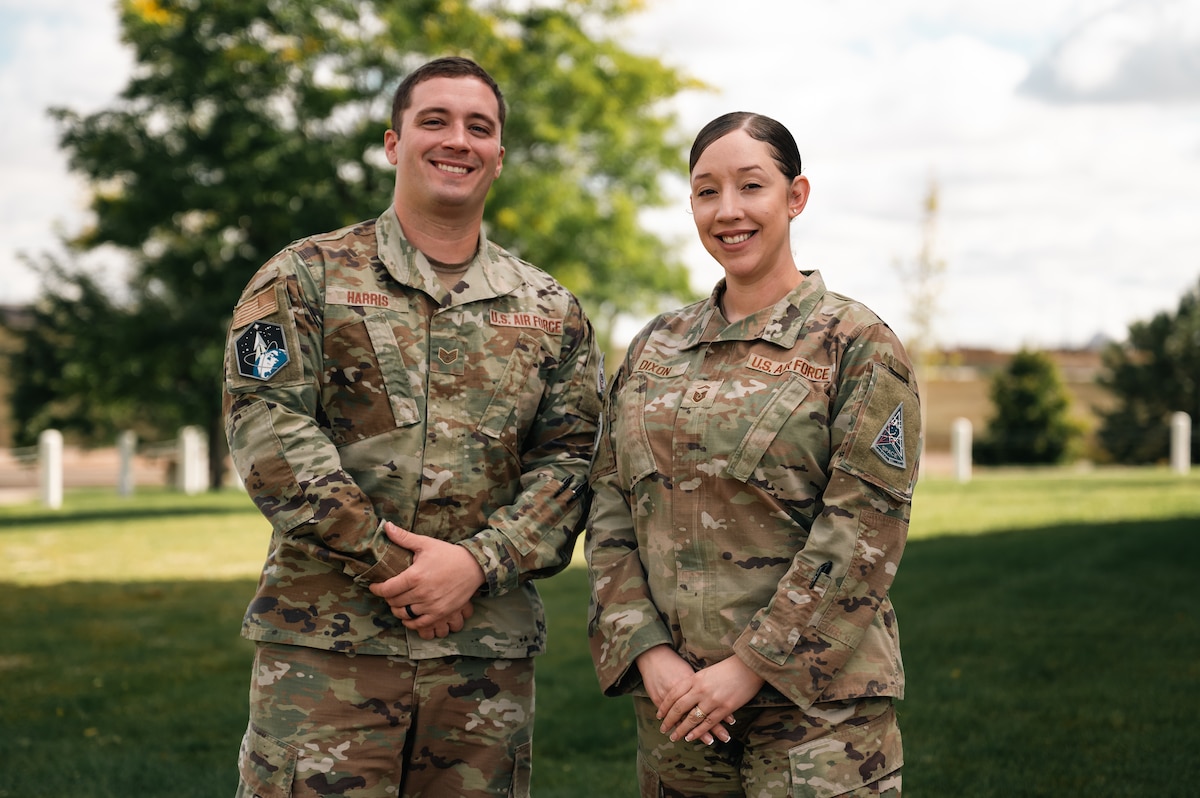 two people pose for a photo