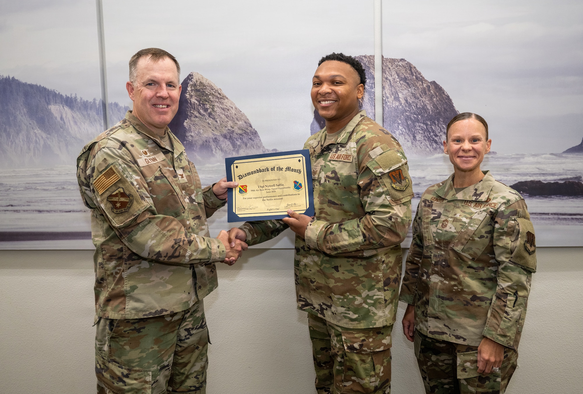 Group of people posing with certificate