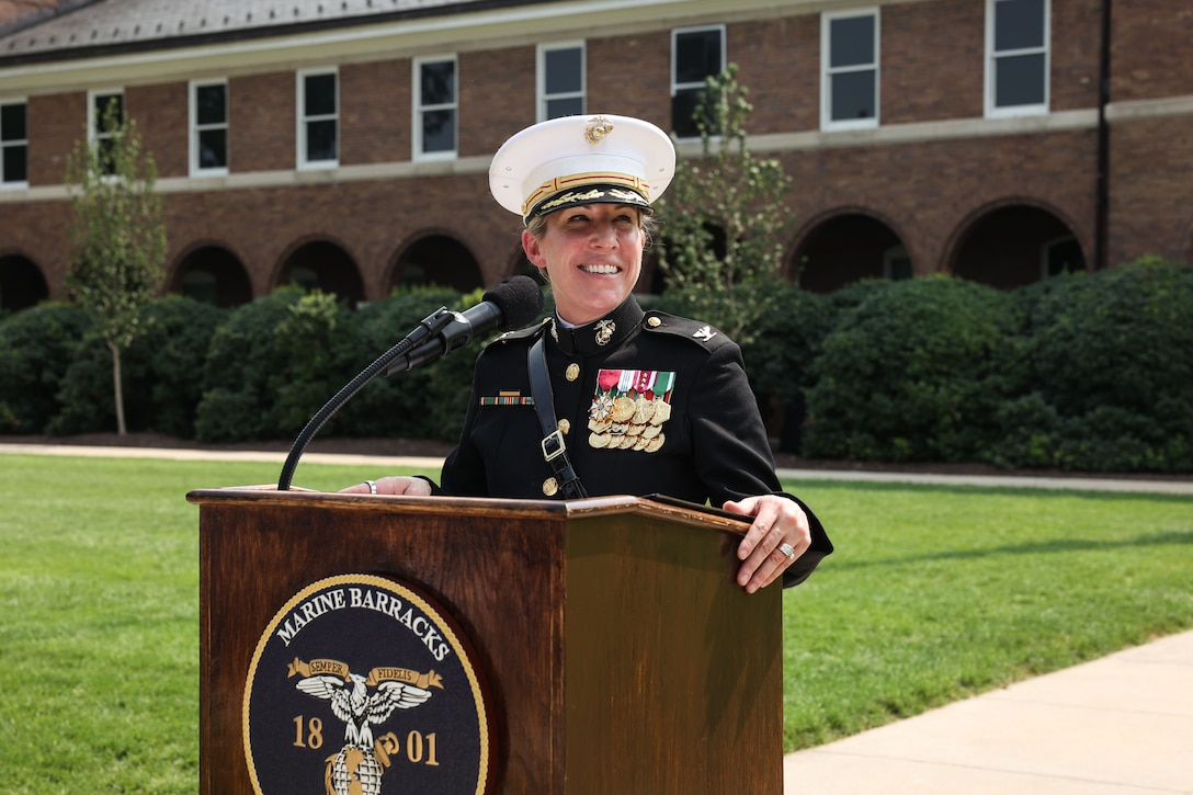 U.S. Marine Corps Col. Carrie C. Batson, outgoing commanding officer of Marine Barracks Washington, delivers remarks during a change of command ceremony at Marine Barracks Washington, D.C., July 16, 2026. Batson has served as commanding officer from 2024-2026, leading 8th & I through historic milestones including several multi-million-dollar renovation projects to improve installation functionality and Marine quality of life, alongside ceremonies for the 60th Presidential Inauguration and several state-funerals. The ceremony took place as the “Oldest Post of the Corps” celebrates 225 years since its founding, a milestone that falls during America's 250th anniversary of independence and just one year after the Marine Corps 250th birthday. (U.S. Marine Corps photo by Cpl. Brynn L. Bouchard)