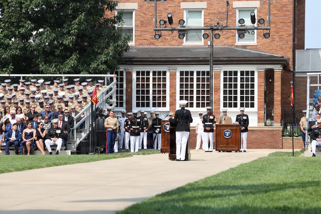 U.S. Marine Corps Col. Carrie C. Batson, outgoing commanding officer of Marine Barracks Washington, delivers remarks during a change of command ceremony at Marine Barracks Washington, D.C., July 16, 2026. Batson has served as commanding officer from 2024-2026, leading 8th & I through historic milestones including several multi-million-dollar renovation projects to improve installation functionality and Marine quality of life, alongside ceremonies for the 60th Presidential Inauguration and several state-funerals. The ceremony took place as the “Oldest Post of the Corps” celebrates 225 years since its founding, a milestone that falls during America's 250th anniversary of independence and just one year after the Marine Corps 250th birthday. (U.S. Marine Corps photo by Lance Cpl. Landon Heredia)