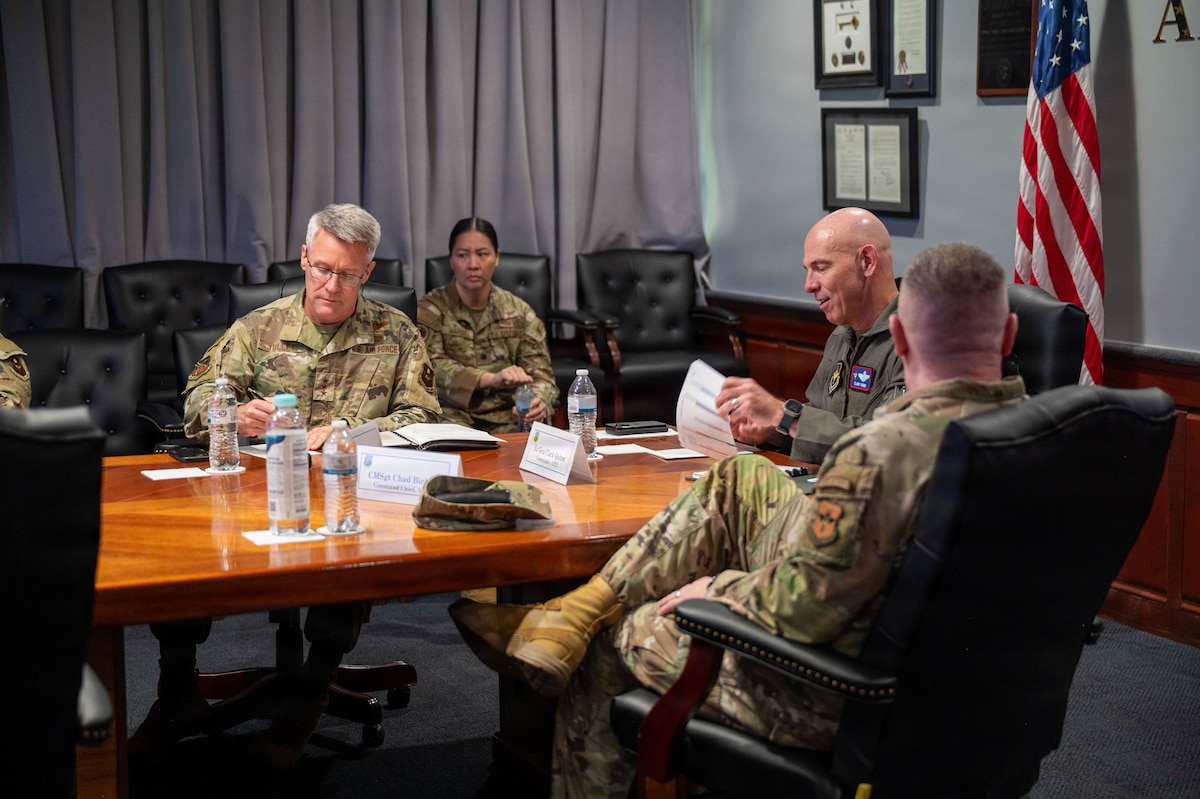 Left, U.S. Air Force Lt. Gen. Dan Tulley, commander
of Air University, Lt. Col. Kathleen Marquez,
COMAETC executive officer, Lt. Gen. Clark J. Quinn,
commander of Air Education and Training
Command, and Chief Master Sgt. Chad W. Bickley,
Air Education and Training command chief, attend a
meeting about infrastructure and facility challenges
at Maxwell Air Force Base, Alabama, June 4, 2026.