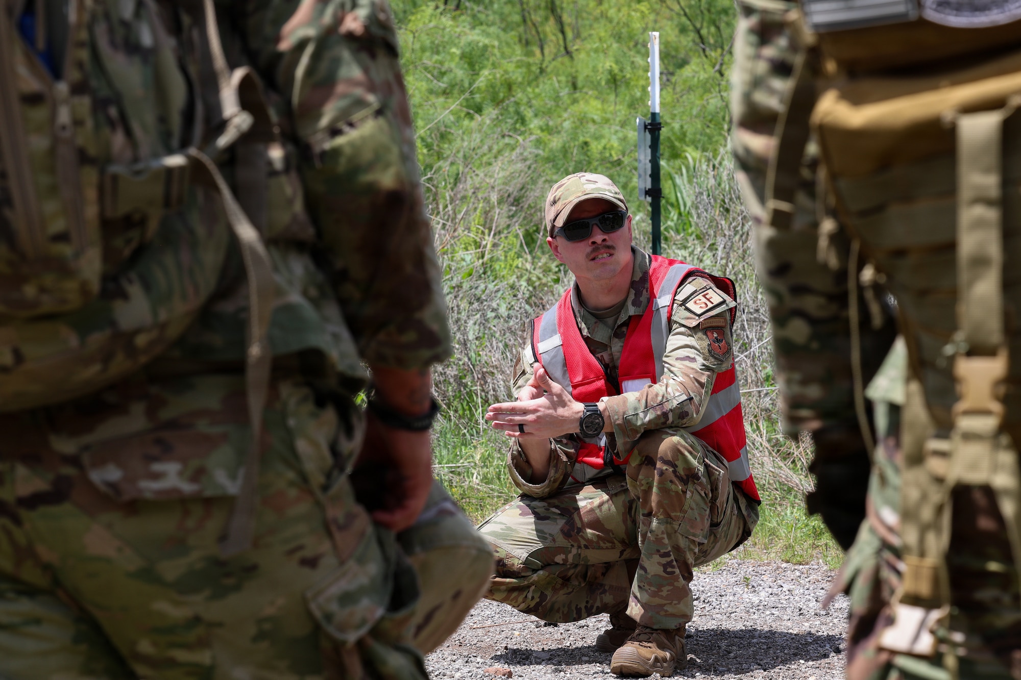 U.S. Air Force Tech. Sgt. Micah Fordham, 82nd Security Forces Squadron noncommissioned officer in charge of training, speaks with 82nd SFS defenders during the formation and order of movement portion of Silent Whisper at Sheppard Air Force Base, Texas, April 23, 2026.