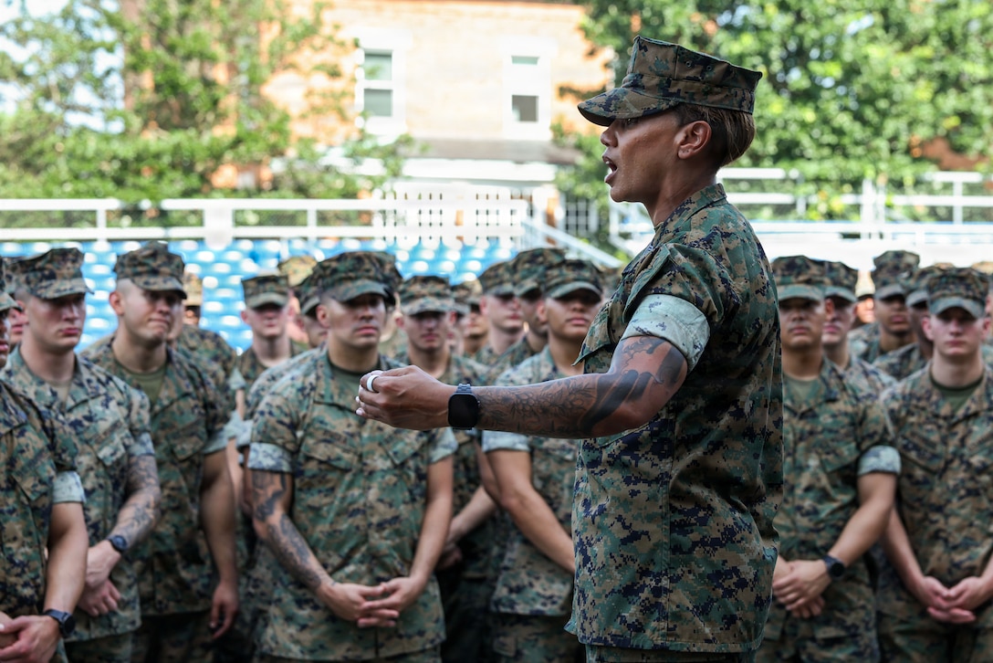 U.S. Marine Corps Master Sgt. Trelaine Buffaloe, maintenance chief, Headquarters and Service Company, Marine Barracks Washington, delivers a weekend safety brief during a battalion formation at Marine Barracks Washington, D.C., July 2, 2026. Marines around 8th & I are recognized monthly during battalion formations. These formations also serve as an opportunity to communicate command priorities, foster esprit de corps, and reinforce the discipline, professionalism, and commitment to excellence expected of every Marine assigned to Marine Barracks Washington. (U.S. Marine Corps photo by Cpl. Christopher Prelle)