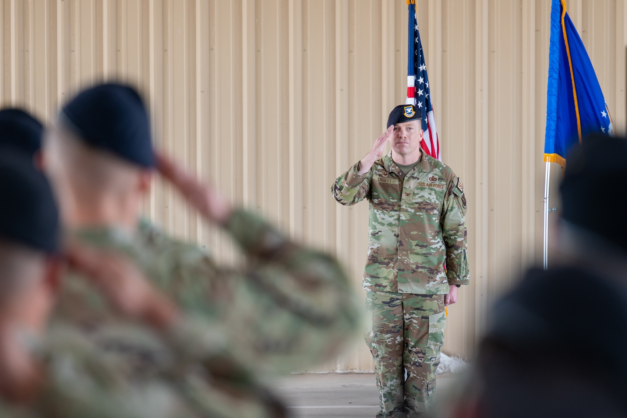 Col. Alexander R. Liggett, incoming 377th Security Forces Group commander, renders his first salute to the formation during the 377 SFG change of command ceremony at Kirtland Air Force Base, New Mexico, July 16, 2026.  This time-honored tradition symbolizes the new commander's formal assumption of leadership and recognition of the unit's personnel. (U.S. Air Force photo by Senior Airman Donnell Schroeter)