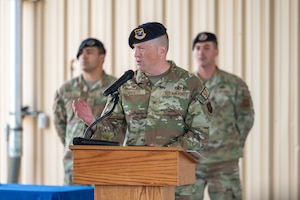 Col. Alexander R. Liggett, 377th Security Forces Group commander, delivers his first address to the unit after taking command at Kirtland Air Force Base, New Mexico, July 16, 2026. The 377 SFG Desert Knights patrol and defend over 52,000 acres of mountain and desert terrain while providing a safe a secure environment for the installation. (U.S. Air Force photo by Senior Airman Donnell Schroeter)