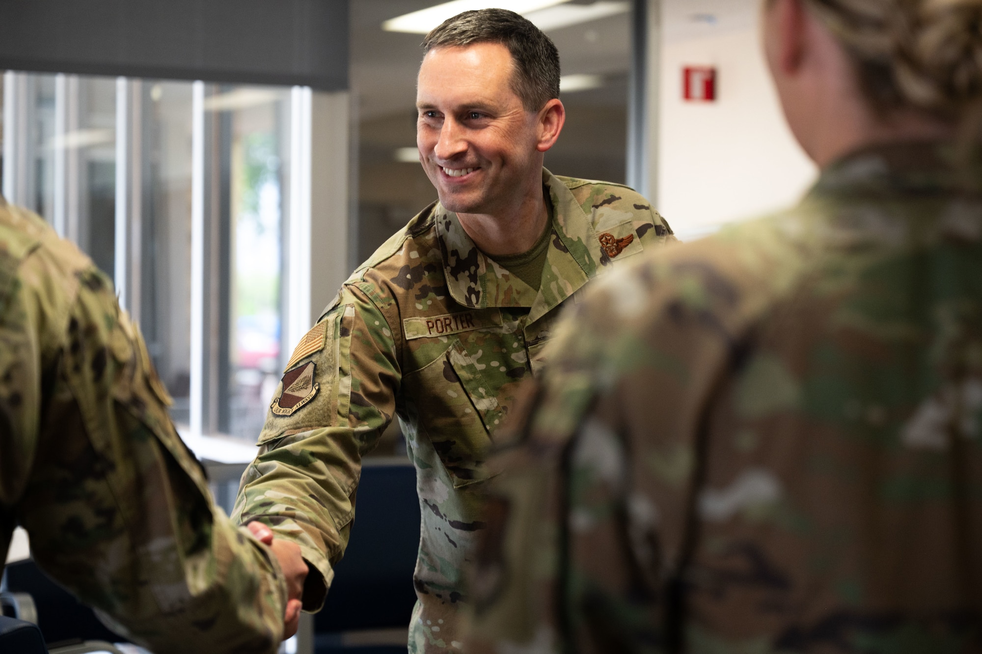 U.S. Air Force Col. Kyle Porter, 355th Wing deputy commander, meets with Airmen assigned to the 355th Medical Group during an immersion tour at Davis-Monthan Air Force Base, Arizona, July 15, 2026. The visit provided Porter with a firsthand look at how the medical group delivers health care and medical support to Airmen across the wing. (U.S. Air Force photo by Airman 1st Class Jaden Kidd)