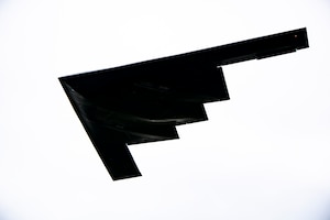 A B-2 Spirit assigned to the 509th Bomb Wing flies overhead at RAF Fairford, England, Aug. 25, 2021. The B-2 flyover was part of a Bomber Task Force mission in which aircraft conduct theater and flight training across Europe and Africa. The BTF missions, which have been occurring since 2018, provide theater familiarization for aircrew members and opportunities for U.S. integration with NATO allies and regional partners. The bomber missions enhance readiness and provide the training necessary to respond to any potential crisis or challenge across the globe. (U.S. Air Force photo by Senior Airman Eugene Oliver)