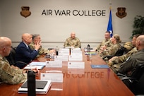 U.S. Air Force Brig. Gen. Jocelyn Schermerhorn,
commander of Air War College and Lt. Gen. Clark J.
Quinn, commander of Air Education and Training
Command, and other leaders talk about an
overview of the curriculum changes of AWC at
Maxwell Air Force Base, Alabama, June 3, 2026