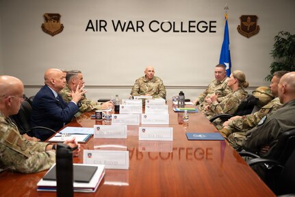 U.S. Air Force Brig. Gen. Jocelyn Schermerhorn,
commander of Air War College and Lt. Gen. Clark J.
Quinn, commander of Air Education and Training
Command, and other leaders talk about an
overview of the curriculum changes of AWC at
Maxwell Air Force Base, Alabama, June 3, 2026