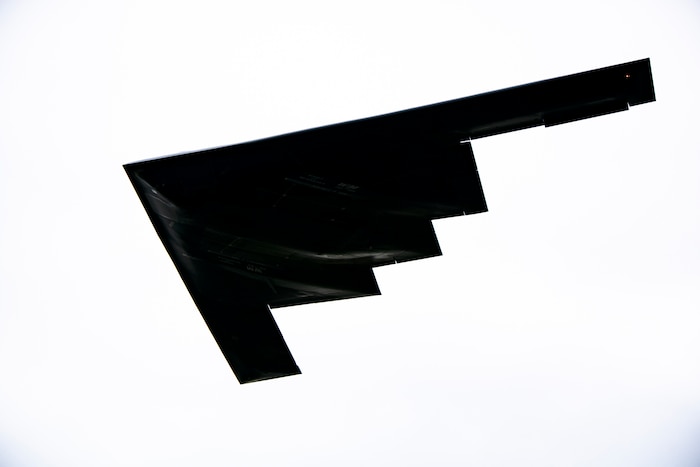 A B-2 Spirit assigned to the 509th Bomb Wing flies overhead at RAF Fairford, England, Aug. 25, 2021. The B-2 flyover was part of a Bomber Task Force mission in which aircraft conduct theater and flight training across Europe and Africa. The BTF missions, which have been occurring since 2018, provide theater familiarization for aircrew members and opportunities for U.S. integration with NATO allies and regional partners. The bomber missions enhance readiness and provide the training necessary to respond to any potential crisis or challenge across the globe. (U.S. Air Force photo by Senior Airman Eugene Oliver)