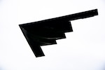 A B-2 Spirit assigned to the 509th Bomb Wing flies overhead at RAF Fairford, England, Aug. 25, 2021. The B-2 flyover was part of a Bomber Task Force mission in which aircraft conduct theater and flight training across Europe and Africa. The BTF missions, which have been occurring since 2018, provide theater familiarization for aircrew members and opportunities for U.S. integration with NATO allies and regional partners. The bomber missions enhance readiness and provide the training necessary to respond to any potential crisis or challenge across the globe. (U.S. Air Force photo by Senior Airman Eugene Oliver)