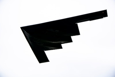 A B-2 Spirit assigned to the 509th Bomb Wing flies overhead at RAF Fairford, England, Aug. 25, 2021. The B-2 flyover was part of a Bomber Task Force mission in which aircraft conduct theater and flight training across Europe and Africa. The BTF missions, which have been occurring since 2018, provide theater familiarization for aircrew members and opportunities for U.S. integration with NATO allies and regional partners. The bomber missions enhance readiness and provide the training necessary to respond to any potential crisis or challenge across the globe. (U.S. Air Force photo by Senior Airman Eugene Oliver)